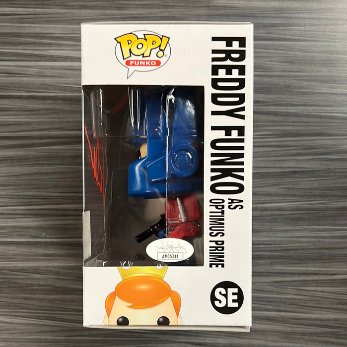 Funko POP! Freddy Funko As Optimus Prime (2022 BlackLight Battle)(1500 PCS)(Signed/Peter Cullen/JSA) #SE